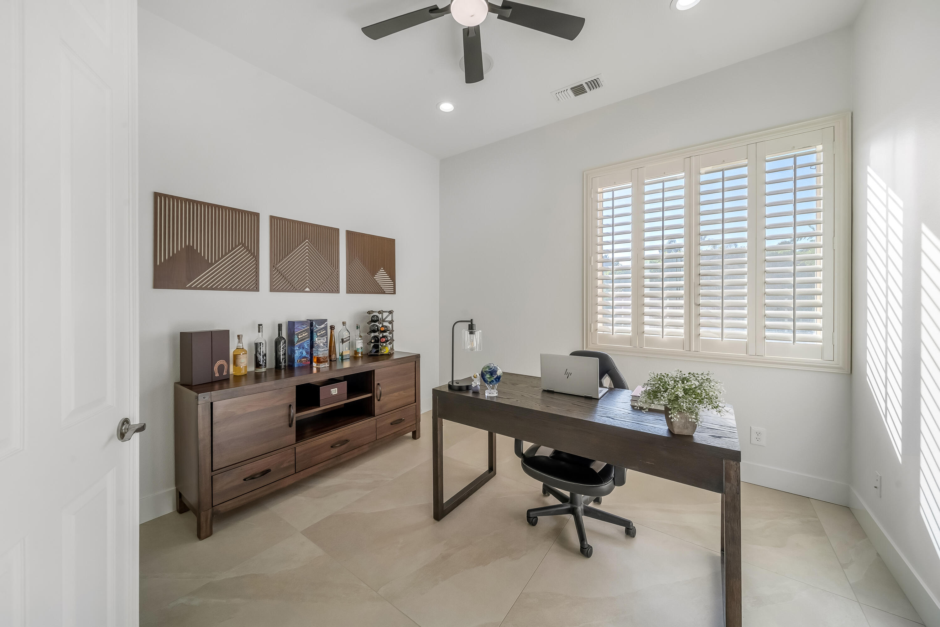 80262 Amazon Avenue Indio, CA 92201 - Photo 44 of 69 a view of a workspace with furniture and a window