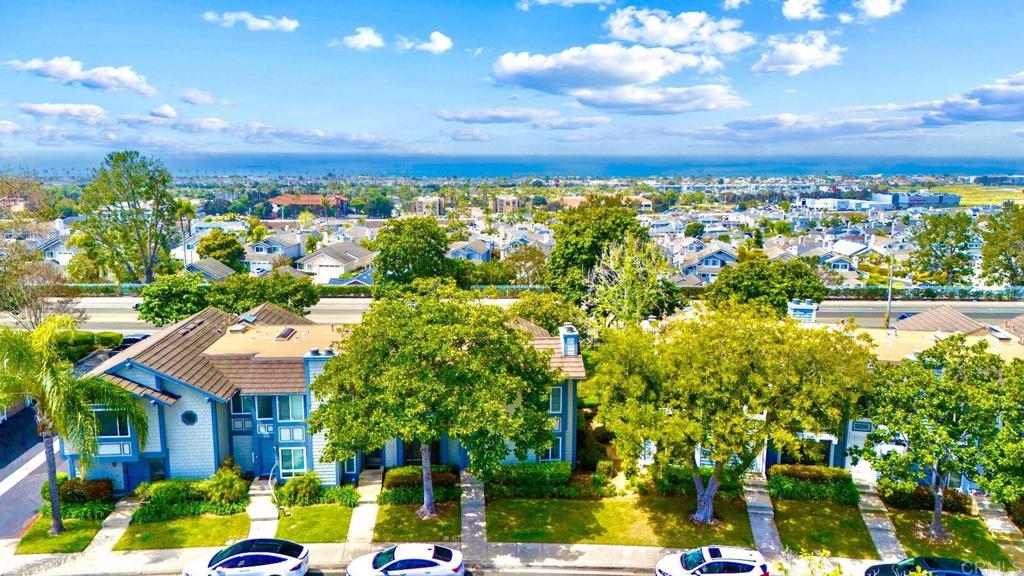 6865 Carnation Drive Carlsbad, CA 92011 - Photo 1 of 1 a view of a city with tall buildings in the background