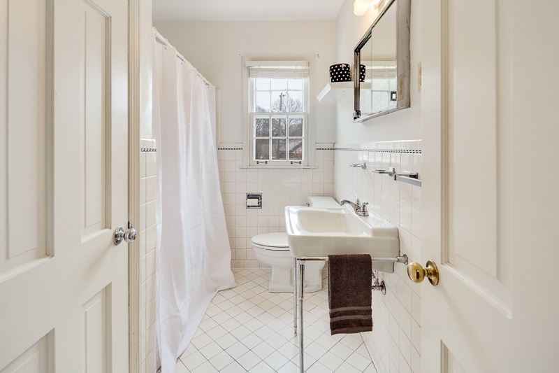 350 North Perkins Road Memphis, TN 38117 - Photo 17 of 25 The second bathroom is downstairs and convenient for bedrooms 2 and 3, as well as for guests.