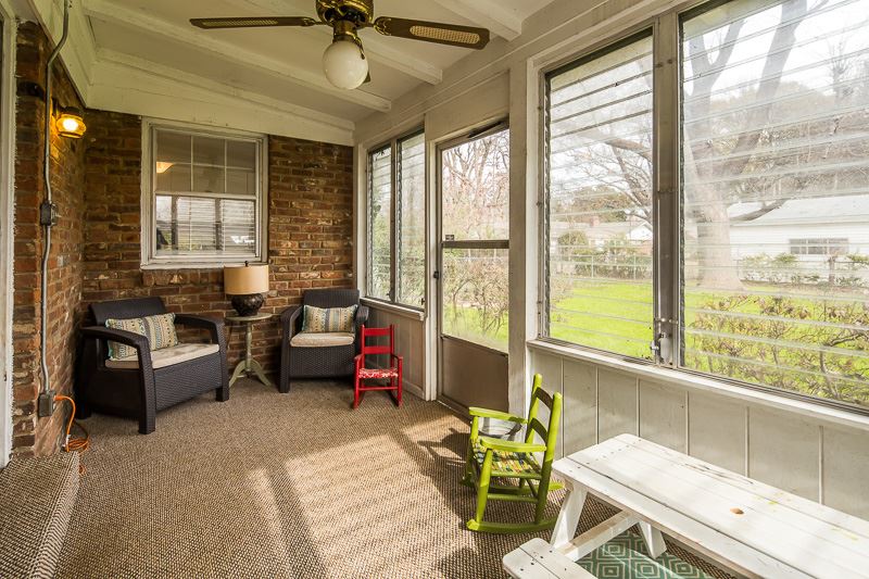 350 North Perkins Road Memphis, TN 38117 - Photo 23 of 25 The sunroom is off the den and overlooks the huge backyard. The home is situated on .42 acres, with most of that space in the backyard.