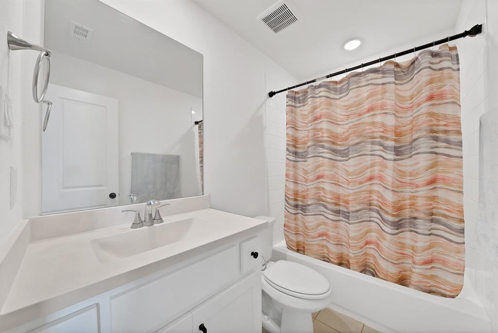 4222 Crown Run Road Midlothian, TX 76065 - Photo 29 of 40 White vanity with integrated sink, chrome faucet, and expansive mirror