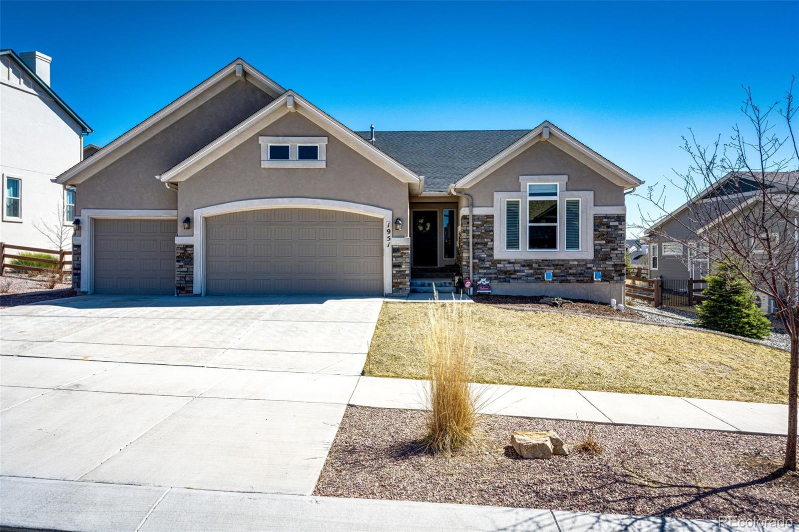 a front view of house with yard