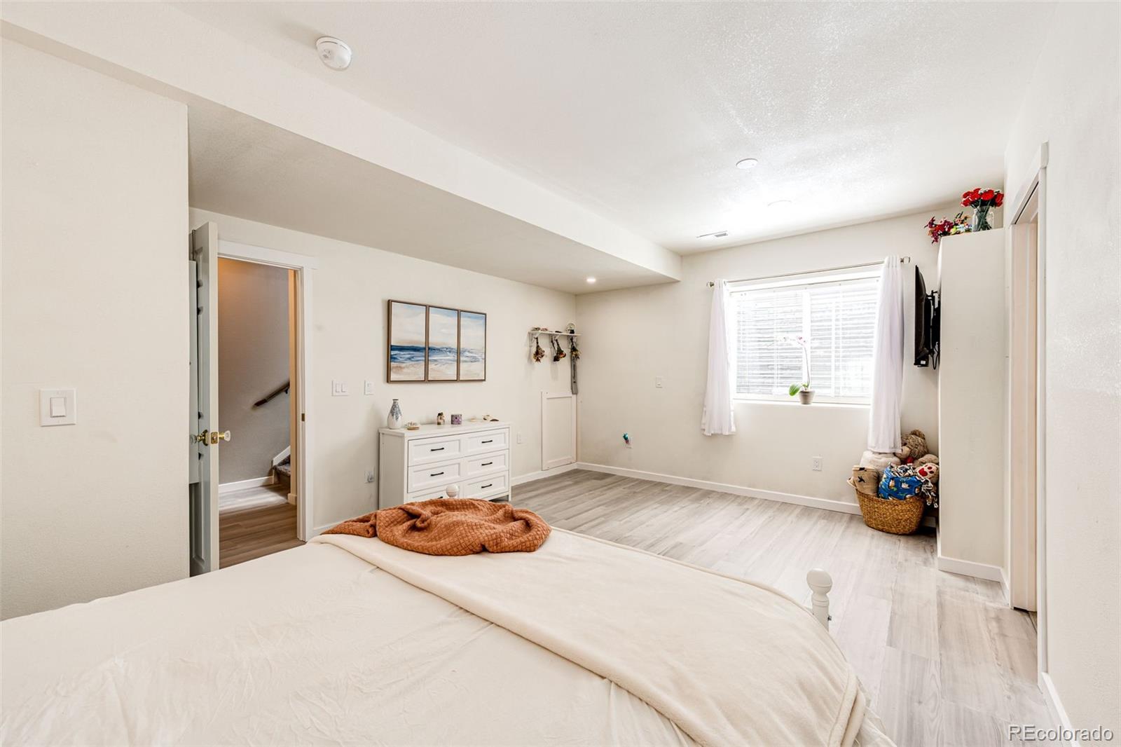 1951 Ruffino Drive Colorado Springs, CO 80921 - Photo 28 of 39 a bedroom with a bed and a window