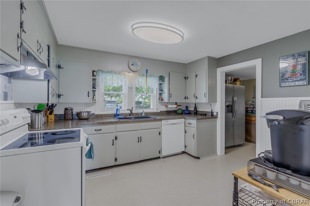 314 Callis Road Lancaster, VA 22503 - Photo 19 of 41 a kitchen with sink and refrigerator