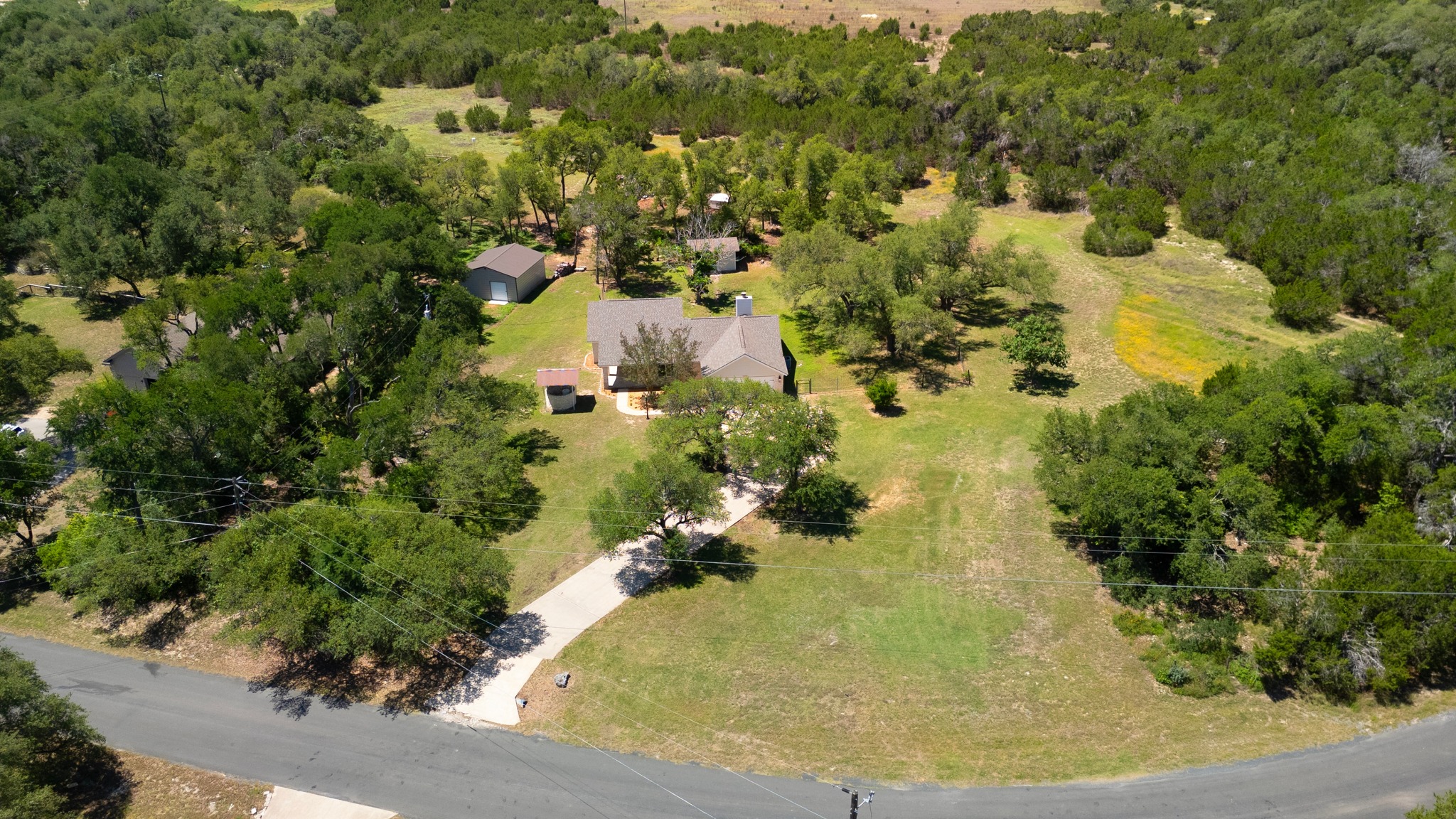 11019 Southwest Oaks Austin, TX 78737 - Photo 33 of 39 This property captures the essence of Austin with peaceful, nature-filled surroundings.