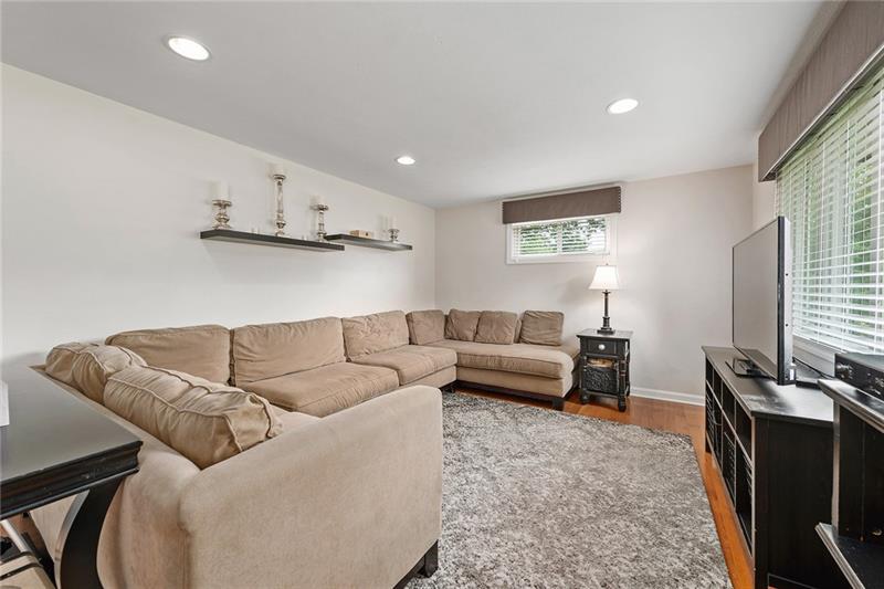 157 McCoy Place Road Sewickley, PA 15143 - Photo 3 of 25 The living room with hardwoods is bright and welcoming and open to the kitchen.
