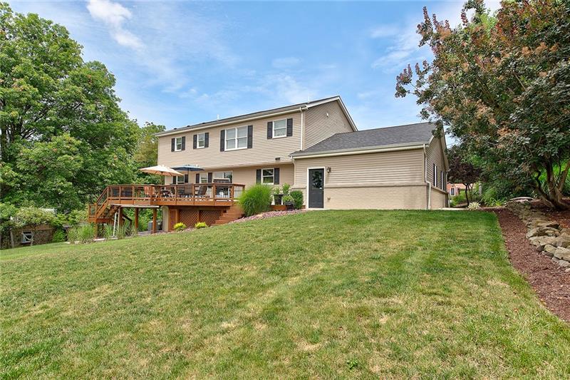 157 McCoy Place Road Sewickley, PA 15143 - Photo 22 of 25 The backyard is very large and perfect entertaining family and friends.