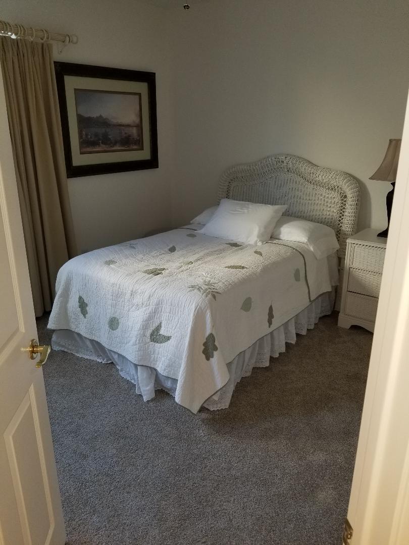 35201 Cornet Way Palm Desert, CA 92211 - Photo 17 of 35 a bed sitting in a bedroom next to a window