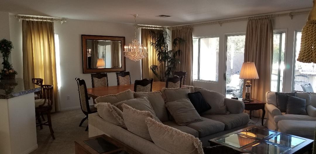 35201 Cornet Way Palm Desert, CA 92211 - Photo 18 of 35 a living room with furniture and a window