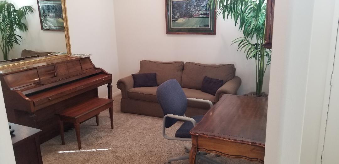 35201 Cornet Way Palm Desert, CA 92211 - Photo 19 of 35 a living room with furniture and a potted plant