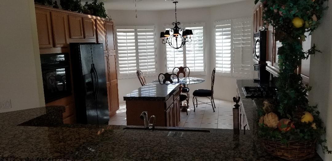 35201 Cornet Way Palm Desert, CA 92211 - Photo 23 of 35 a view of a dining room with furniture and a window