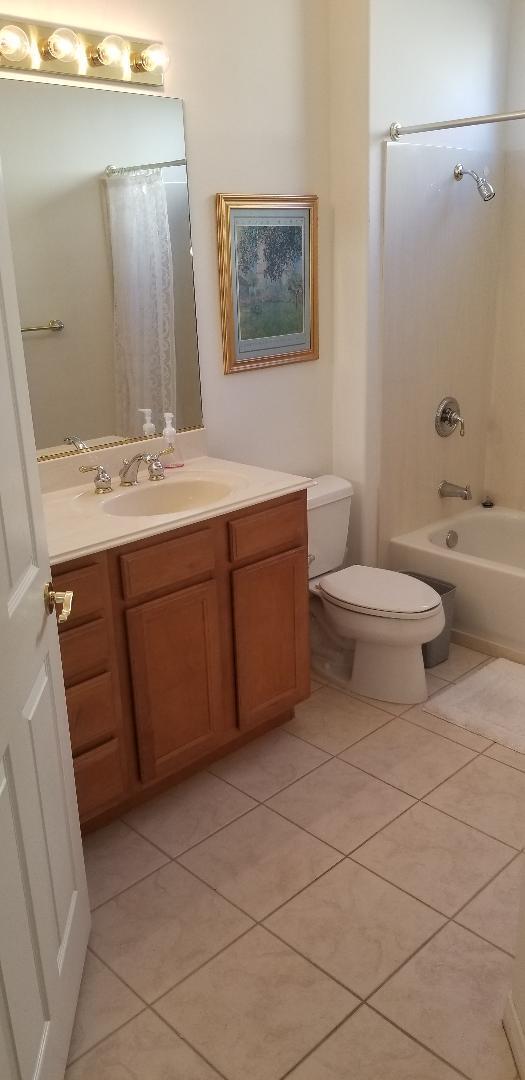 35201 Cornet Way Palm Desert, CA 92211 - Photo 25 of 35 a bathroom with a toilet sink and mirror