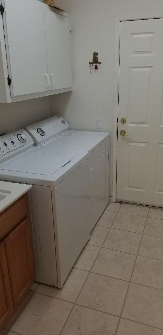35201 Cornet Way Palm Desert, CA 92211 - Photo 26 of 35 a utility room with dryer and washer