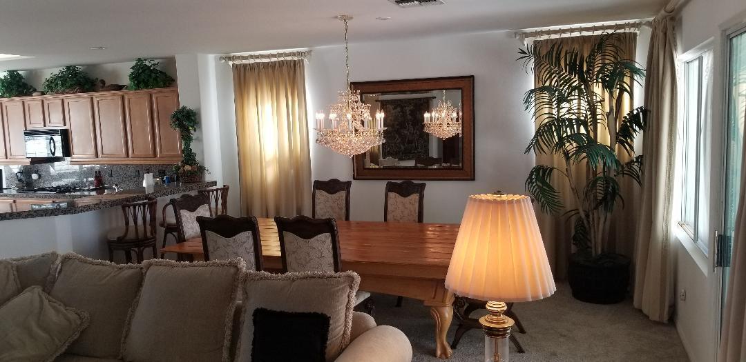 35201 Cornet Way Palm Desert, CA 92211 - Photo 28 of 35 a living room with furniture and a window