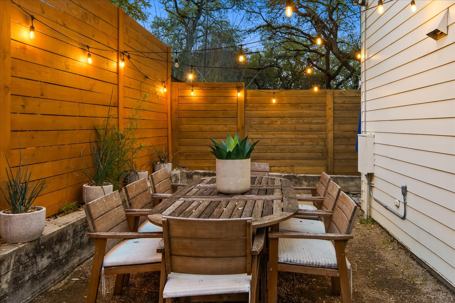 2214 South 3rd Street, Unit B Austin, TX 78704 - Photo 17 of 21 An inviting al fresco dining area creates the perfect setting for outdoor gatherings.