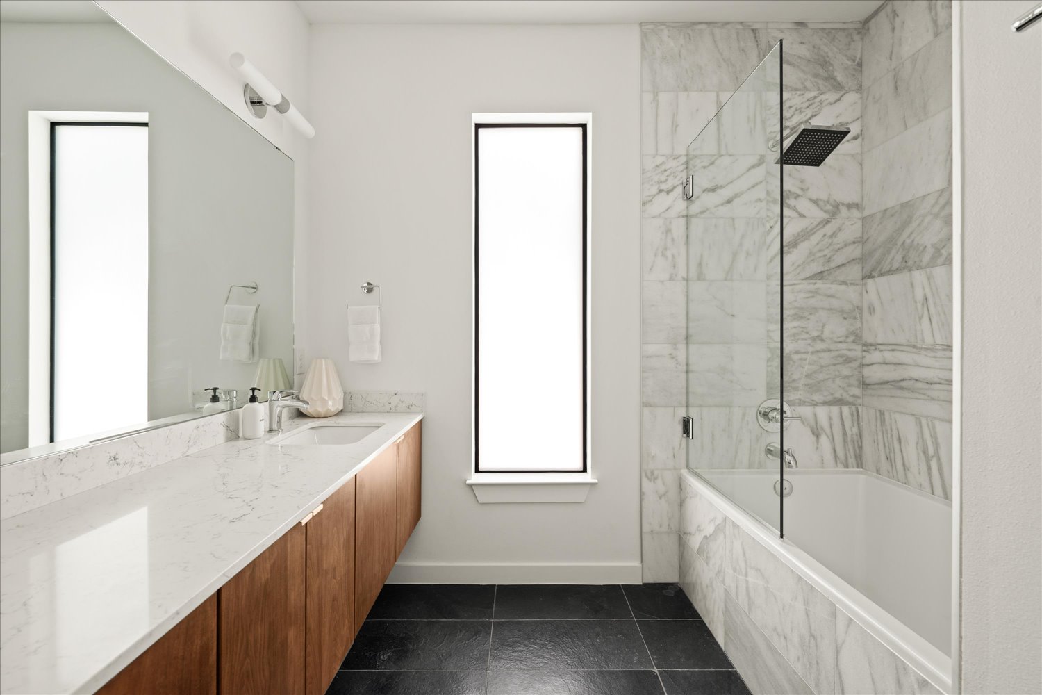 2214 South 3rd Street, Unit B Austin, TX 78704 - Photo 8 of 21 Thoughtful finishes create a spa-like atmosphere throughout.