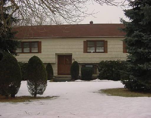 21 Farm View Road Monroe, CT 06468 - Photo 1 of 1 a front view of a house with a yard