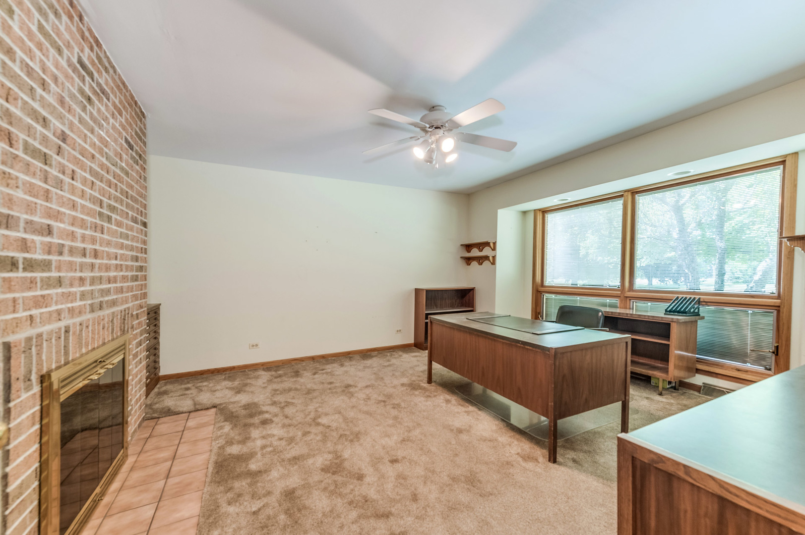 2-n201 LaFox Road Elburn, IL 60119 - Photo 25 of 31 a dining room with furniture and a fireplace