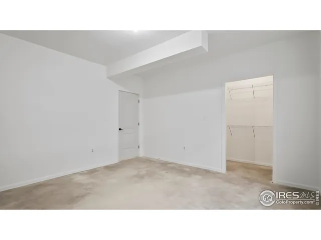 a open hall with a floor to ceiling window