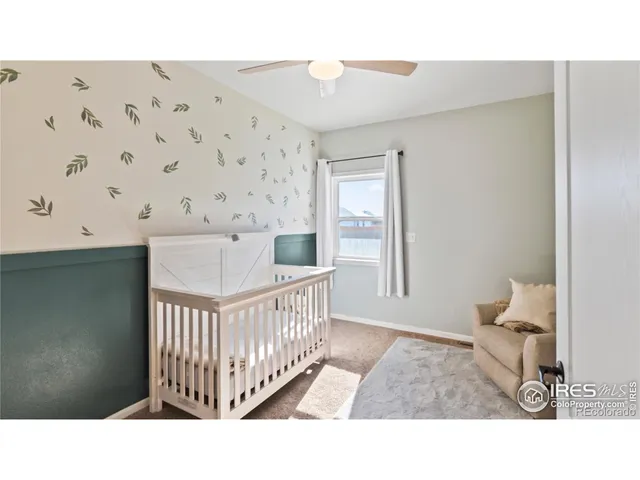 a black and white photo of a bedroom