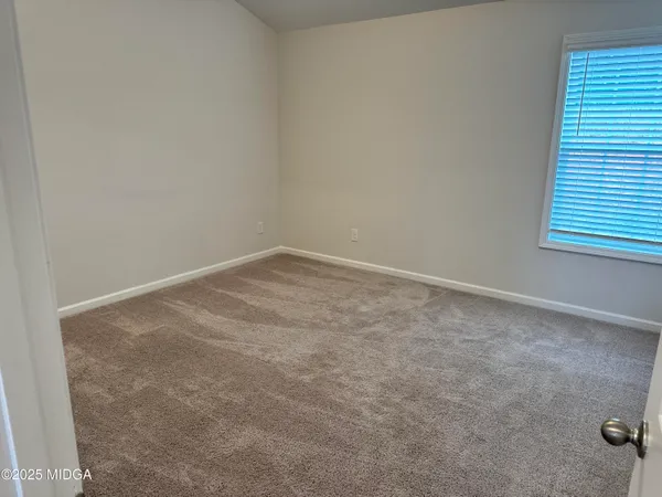 an empty room with a workbench