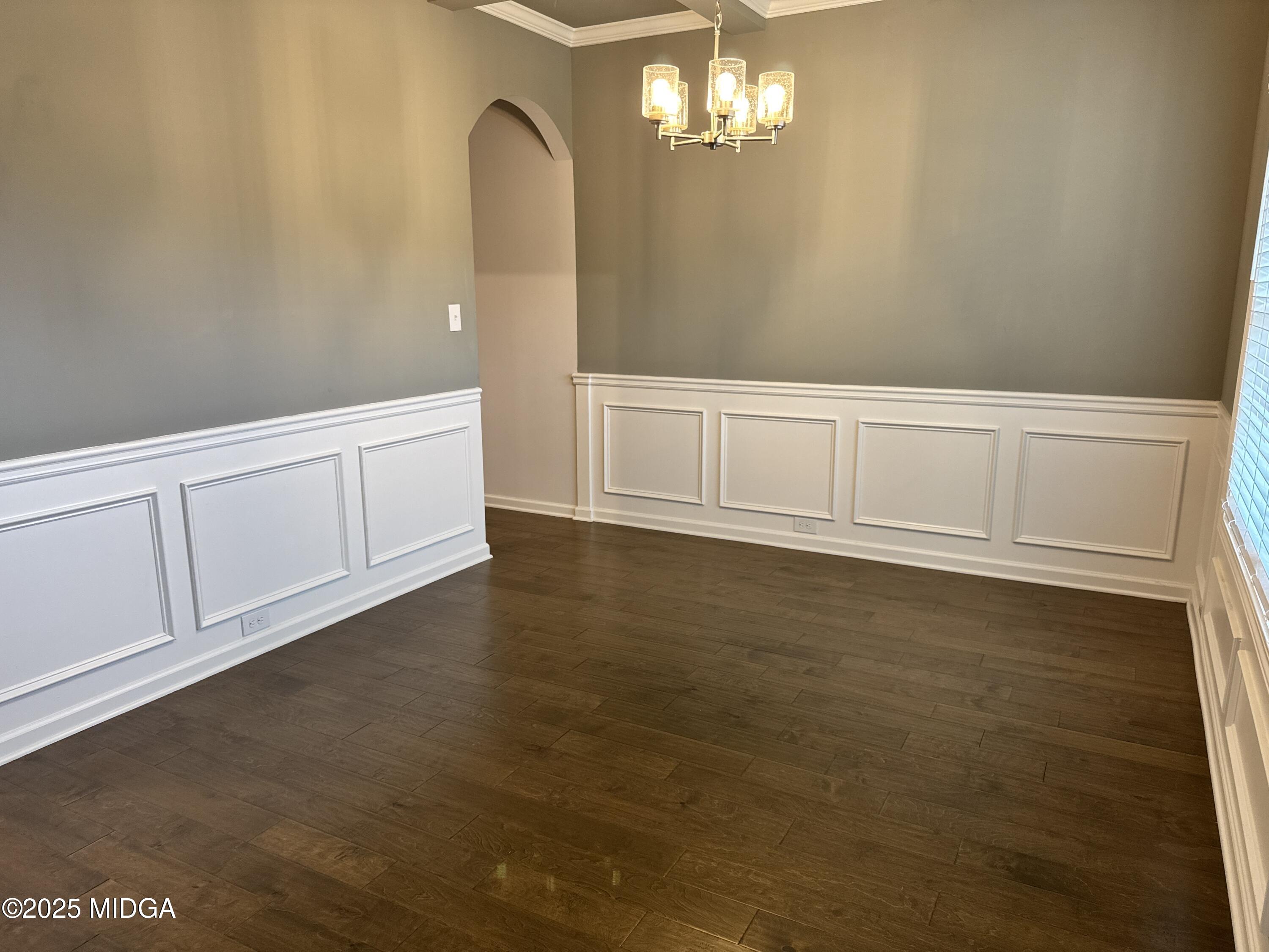 1082 Victorian Boulevard Forsyth, GA 31029 - Photo 3 of 23 a view of an empty room with chandelier
