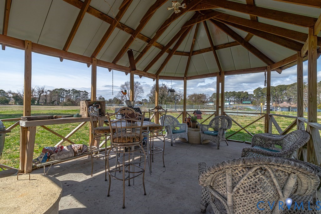 2082 Fleeton Road Reedville, VA 22539 - Photo 34 of 34 a view of chairs and table in the patio