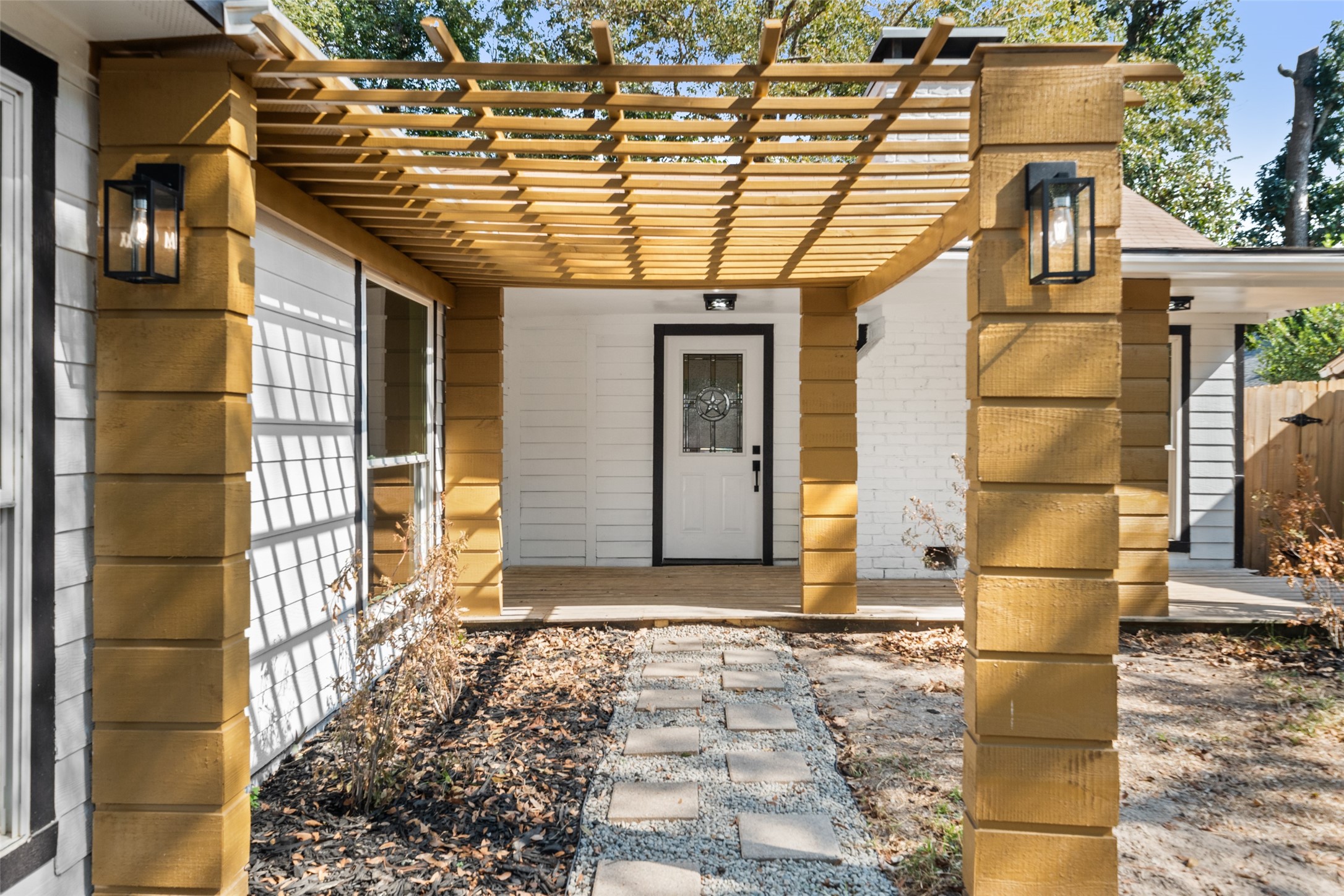 238 Point Clear Drive Conroe, TX 77304 - Photo 4 of 20 a front view of a house with a glass door