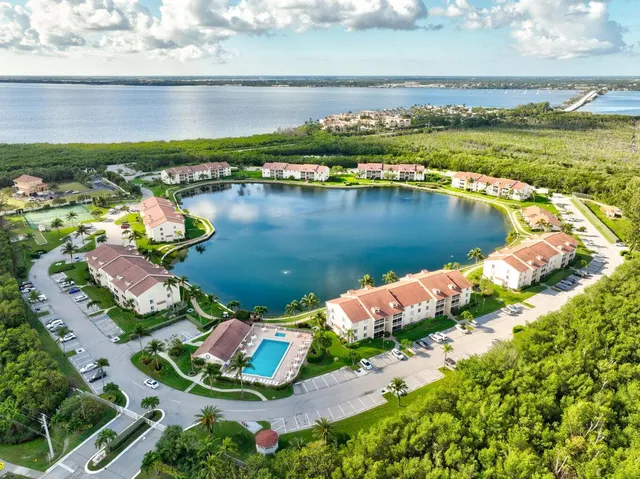 an aerial view of a houses with outdoor space