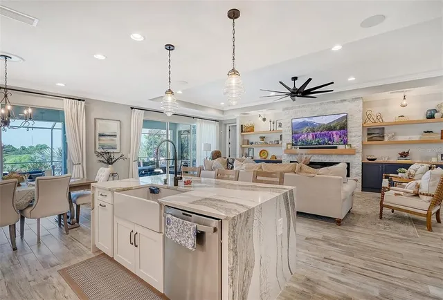 a view of swimming pool with outdoor seating