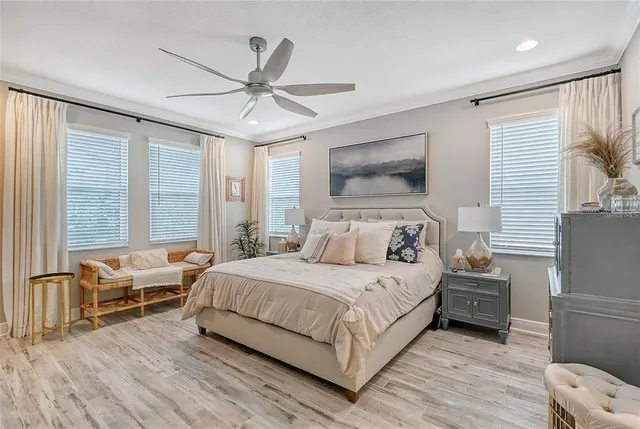 a view of a patio with couches potted plants and a table