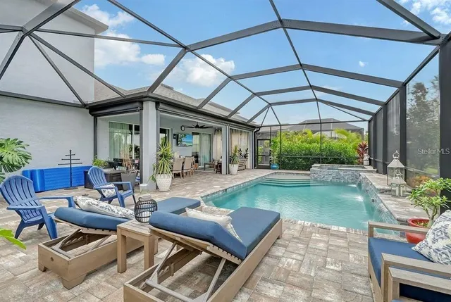 a bathroom with a sink a toilet and shower curtain