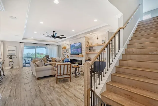 an aerial view of multiple houses with yard