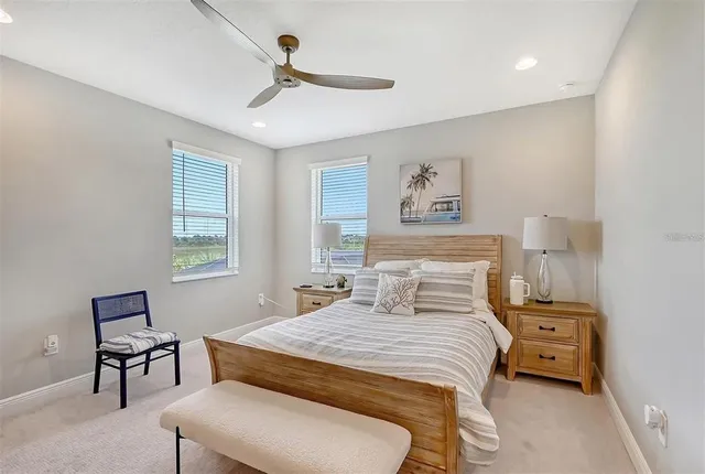 a view of swimming pool with outdoor seating and city view