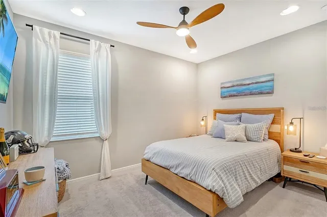 a view of a swimming pool with outdoor seating