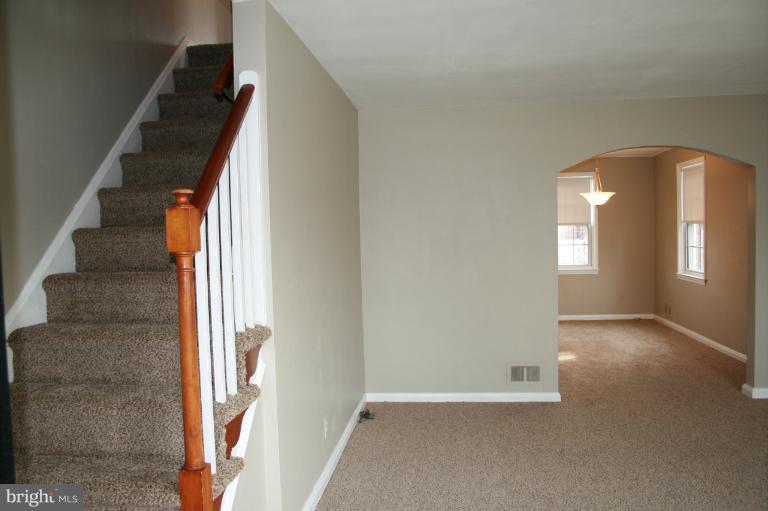 543 Larkfield Road Dundalk, MD 21222 - Photo 26 of 30 an entryway with a staircase