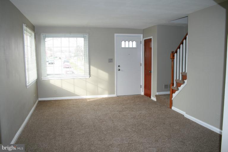 543 Larkfield Road Dundalk, MD 21222 - Photo 8 of 30 an empty room with windows