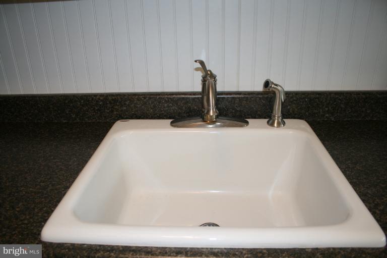 543 Larkfield Road Dundalk, MD 21222 - Photo 10 of 30 a bath tub sitting in a bathroom