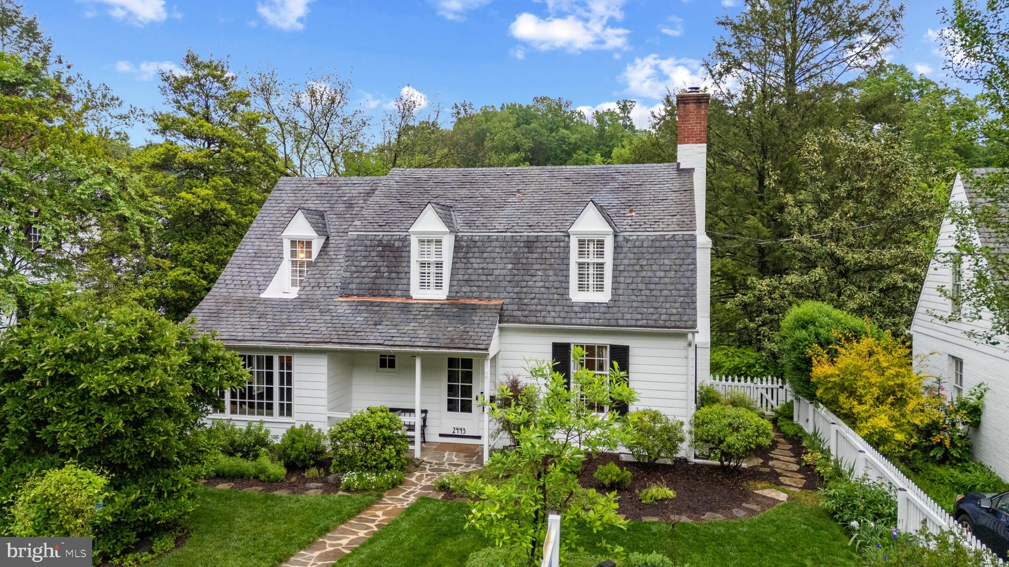 2443 Pickwick Road Baltimore, MD 21207 - Photo 1 of 108 a aerial view of a house with yard and garden