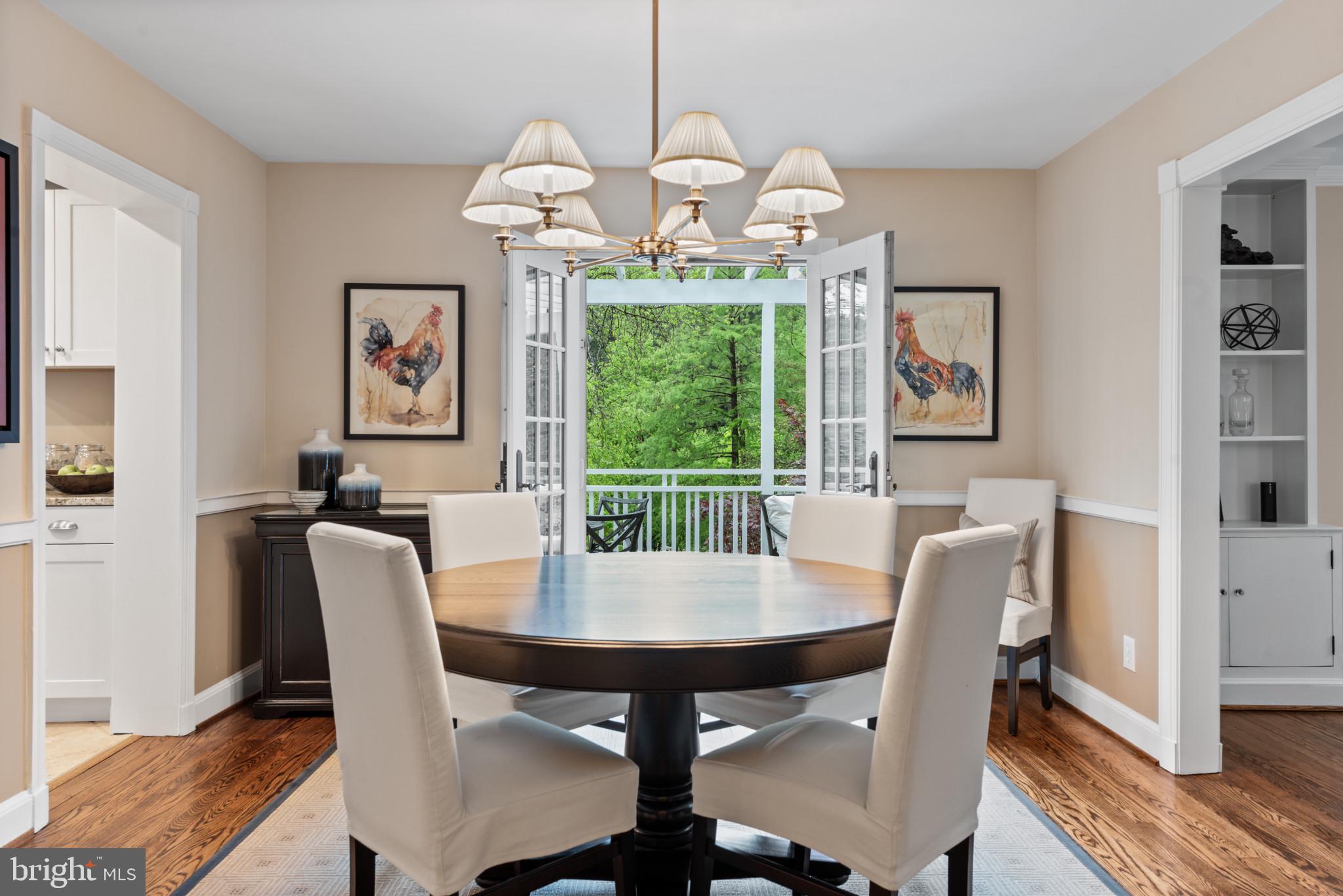 2443 Pickwick Road Baltimore, MD 21207 - Photo 18 of 108 a view of a dining room with furniture window and wooden floor