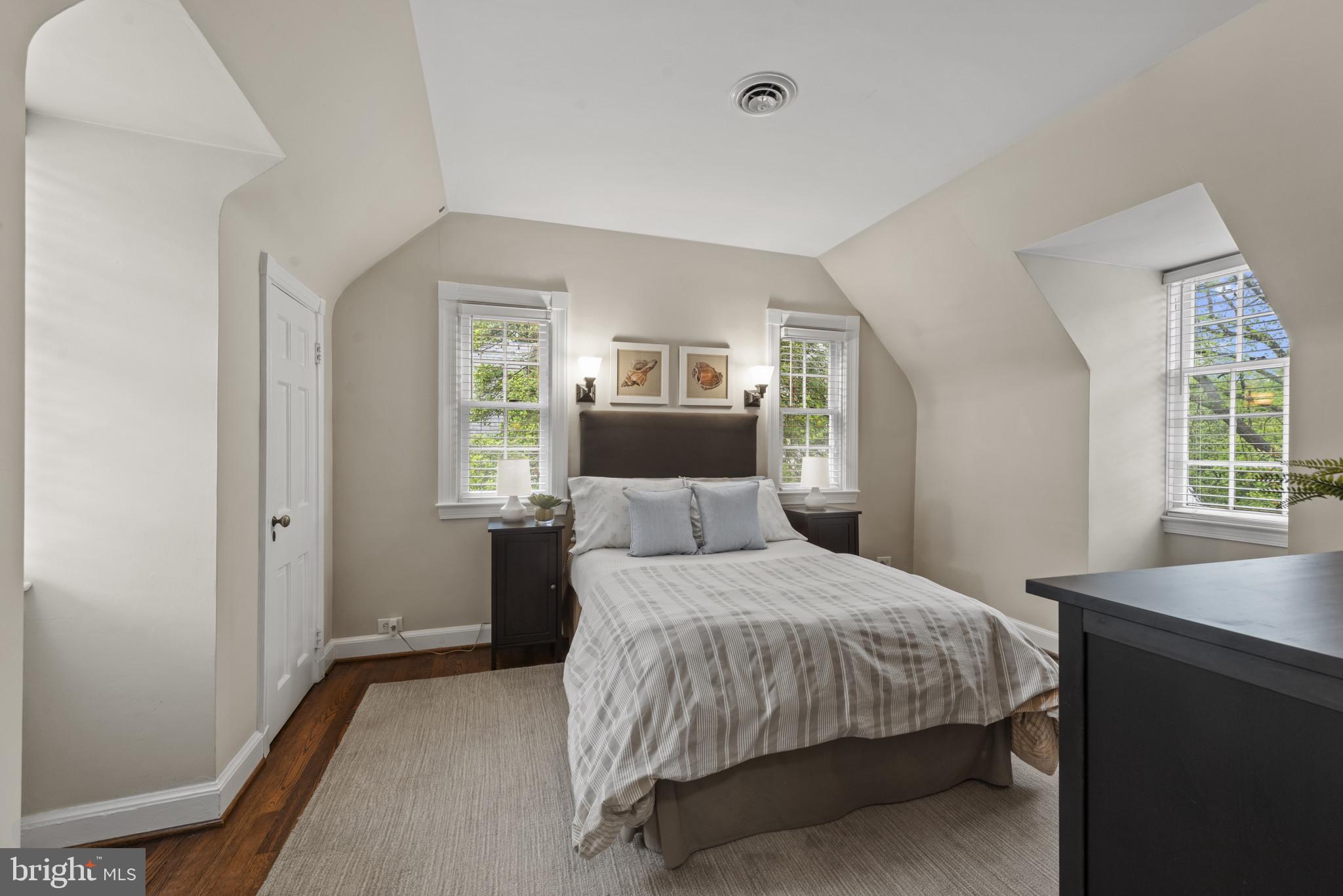 2443 Pickwick Road Baltimore, MD 21207 - Photo 34 of 108 a bedroom with a large bed and a window