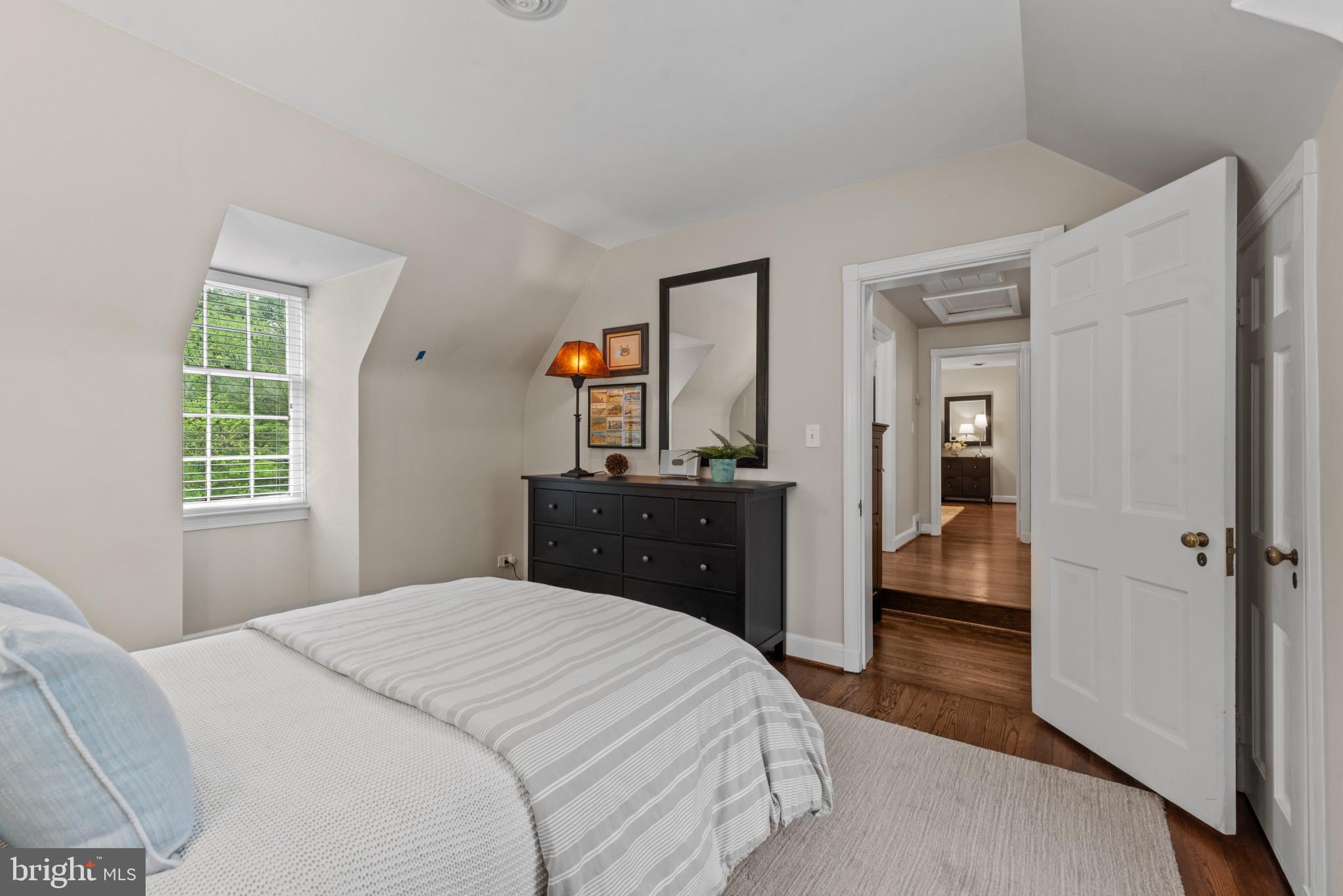 2443 Pickwick Road Baltimore, MD 21207 - Photo 36 of 108 a bedroom with a bed and a dresser