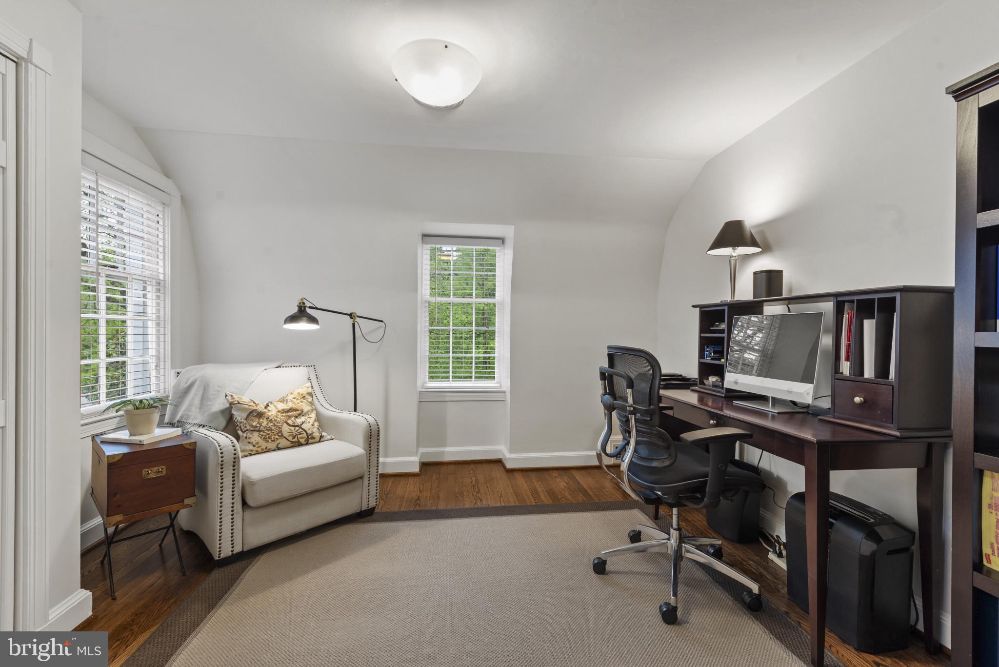 2443 Pickwick Road Baltimore, MD 21207 - Photo 37 of 108 a workspace with a couch and a window