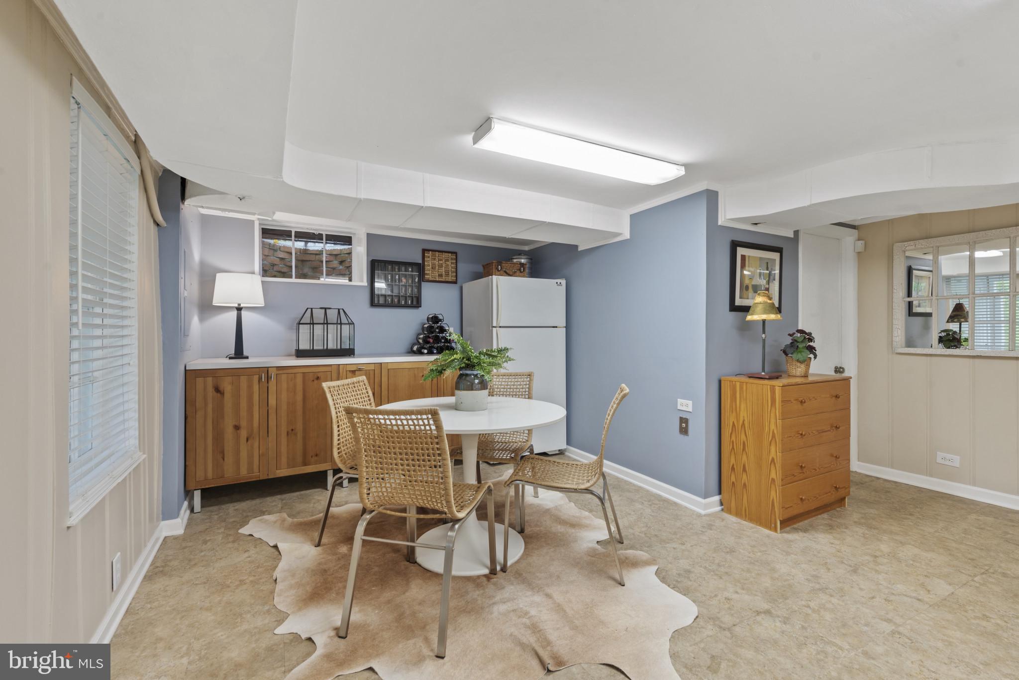2443 Pickwick Road Baltimore, MD 21207 - Photo 42 of 108 a dining room with furniture and window