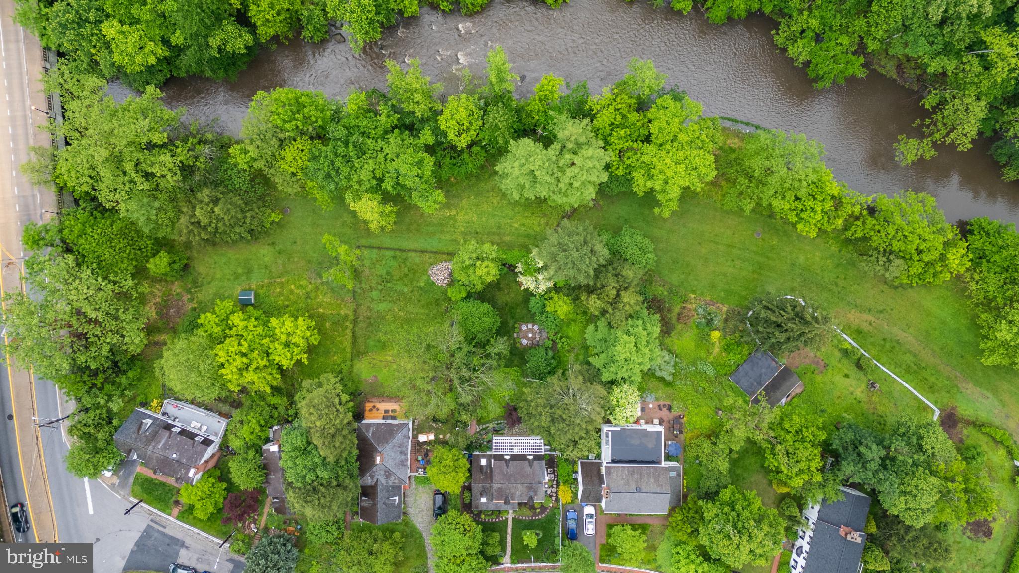 2443 Pickwick Road Baltimore, MD 21207 - Photo 54 of 108 an aerial view of residential house with outdoor space and trees all around