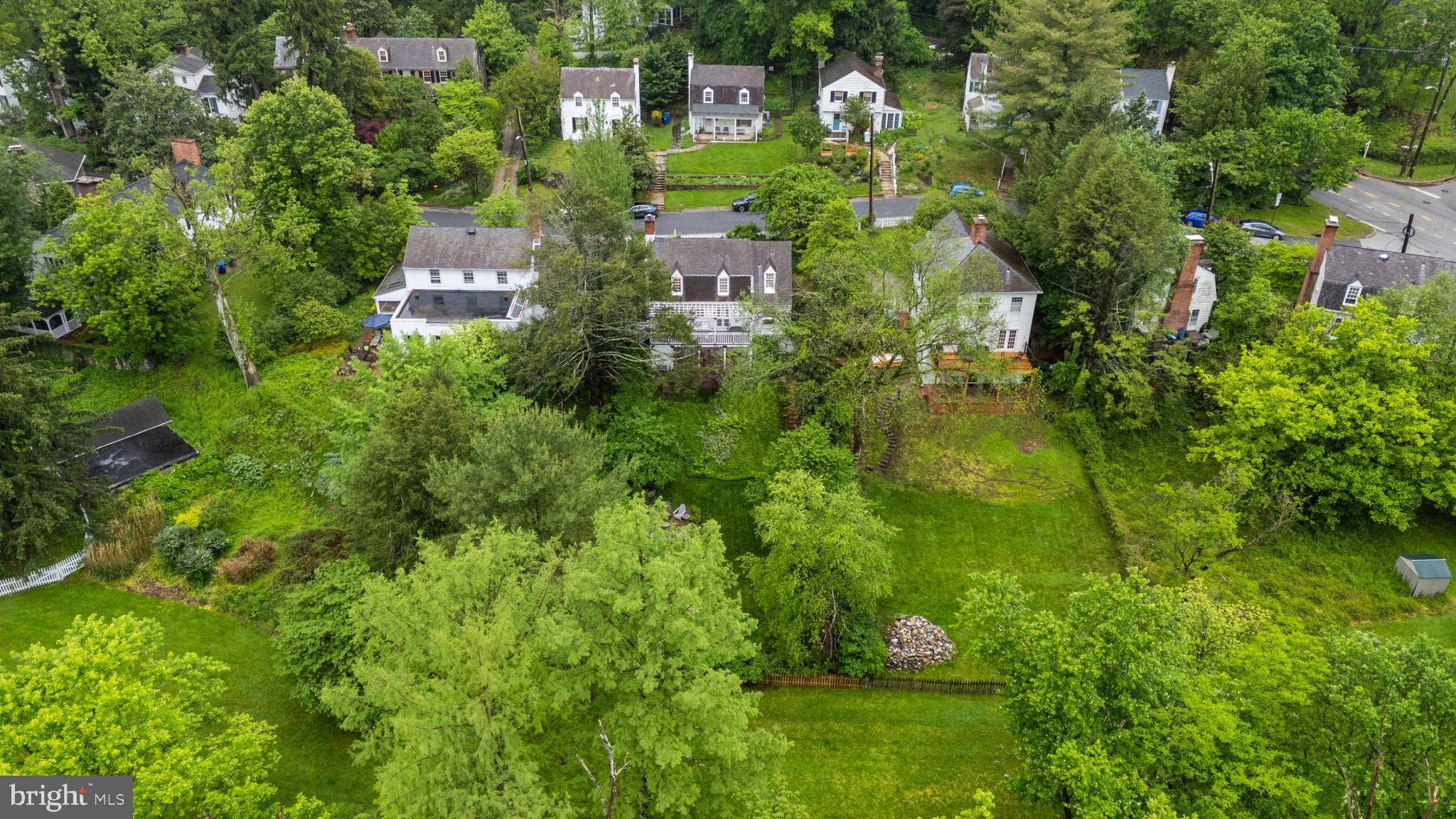 2443 Pickwick Road Baltimore, MD 21207 - Photo 56 of 108 an aerial view of residential house with outdoor space and trees all around
