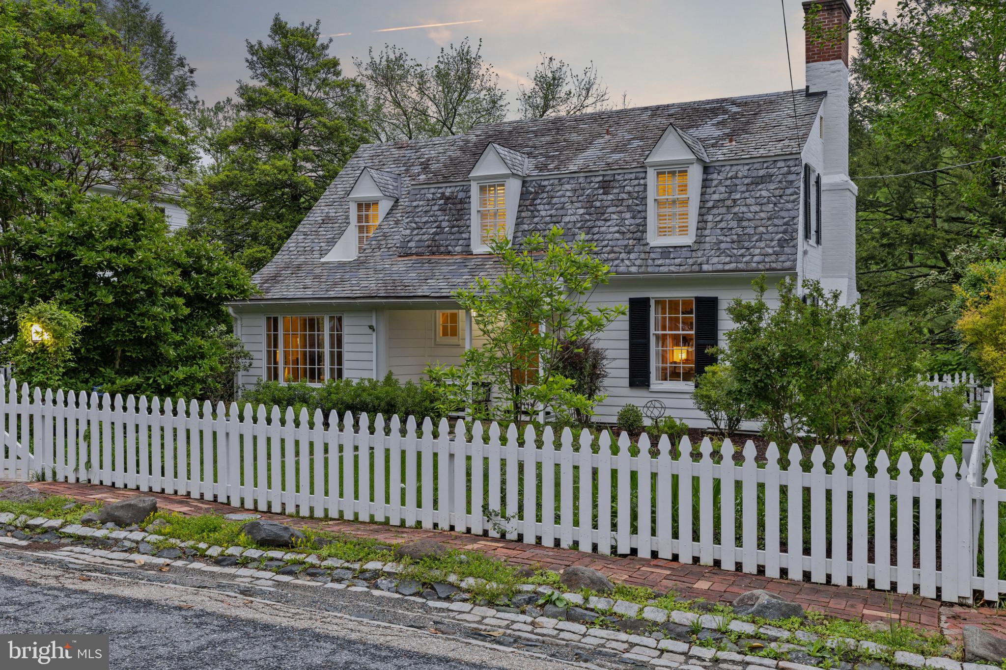 2443 Pickwick Road Baltimore, MD 21207 - Photo 80 of 108 a front view of a house with a garden