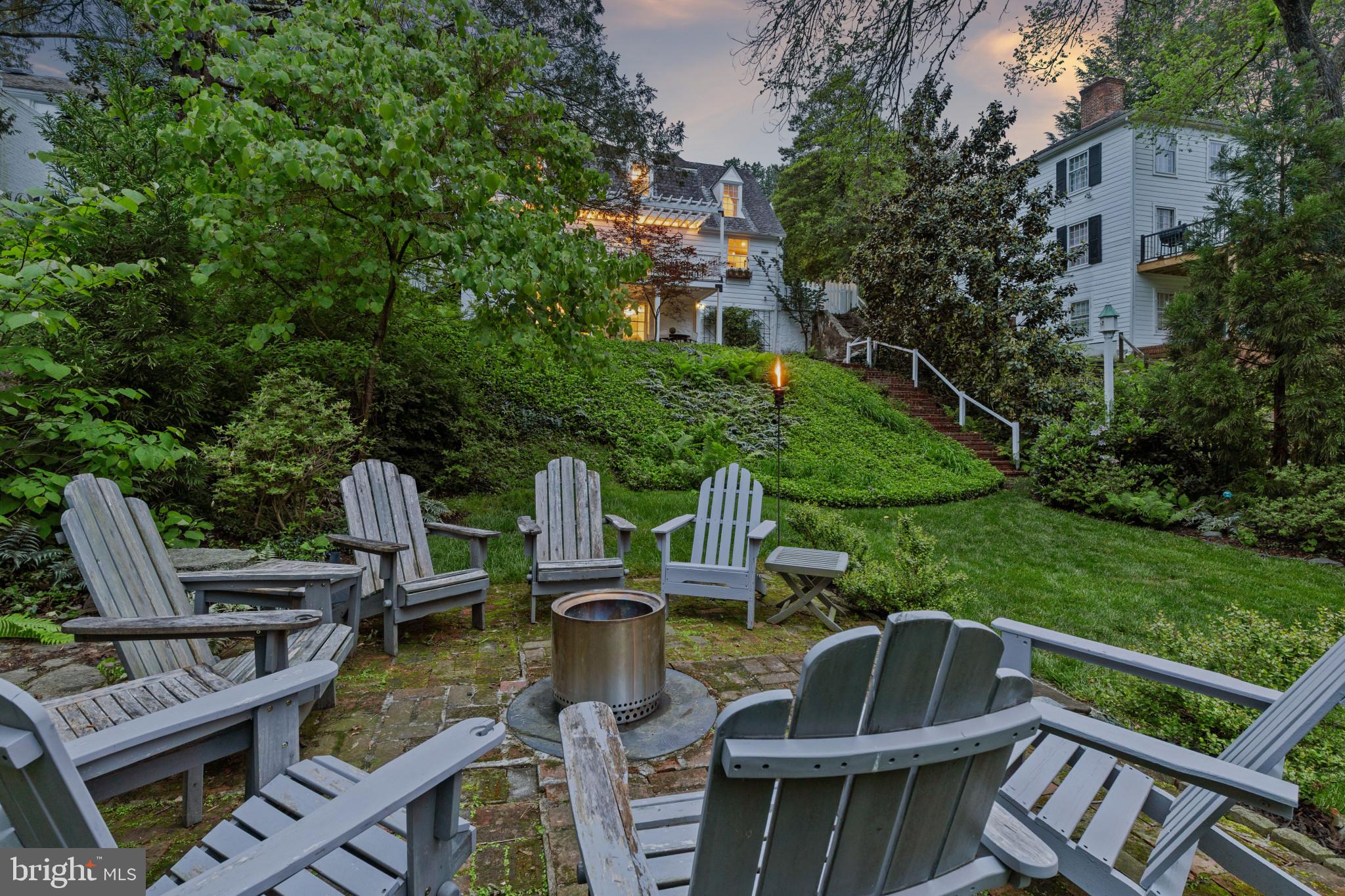 2443 Pickwick Road Baltimore, MD 21207 - Photo 93 of 108 a view of a chairs and table in the patio and a yard