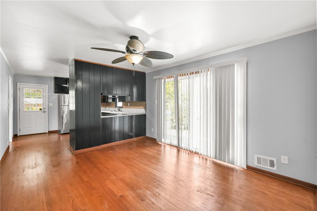 1393 Idlewood Road Tucker, GA 30084 - Photo 14 of 32 a view of a kitchen with wooden floor