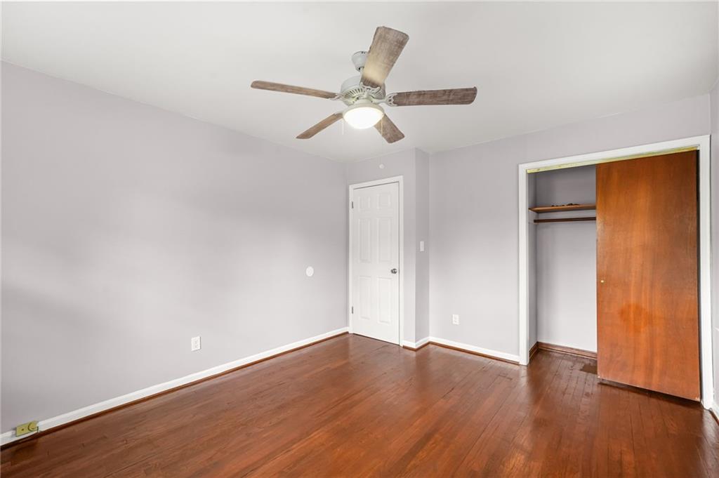 1393 Idlewood Road Tucker, GA 30084 - Photo 20 of 32 a view of empty room with wooden floor